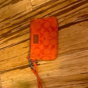 Orange coach wristlet
